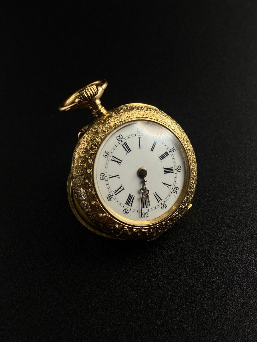 Reloj de Bolsillo Alado
